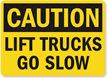 Caution Lift Trucks Go Slow Sign